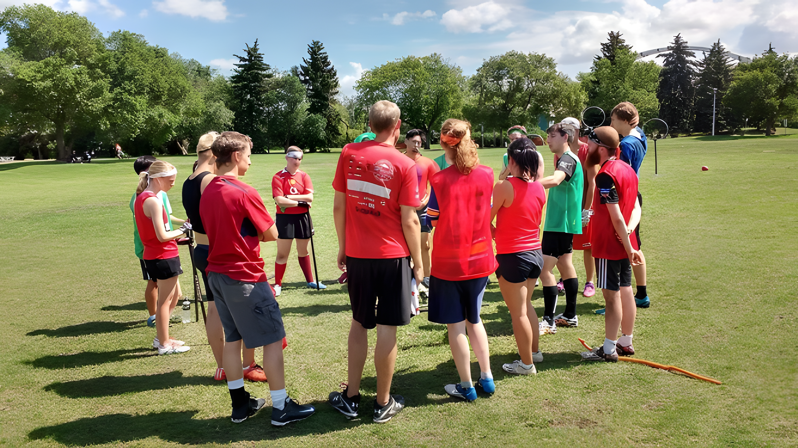 Head Coach Chris Radojewski explaining a drill. Photo credit Quadball Canada.